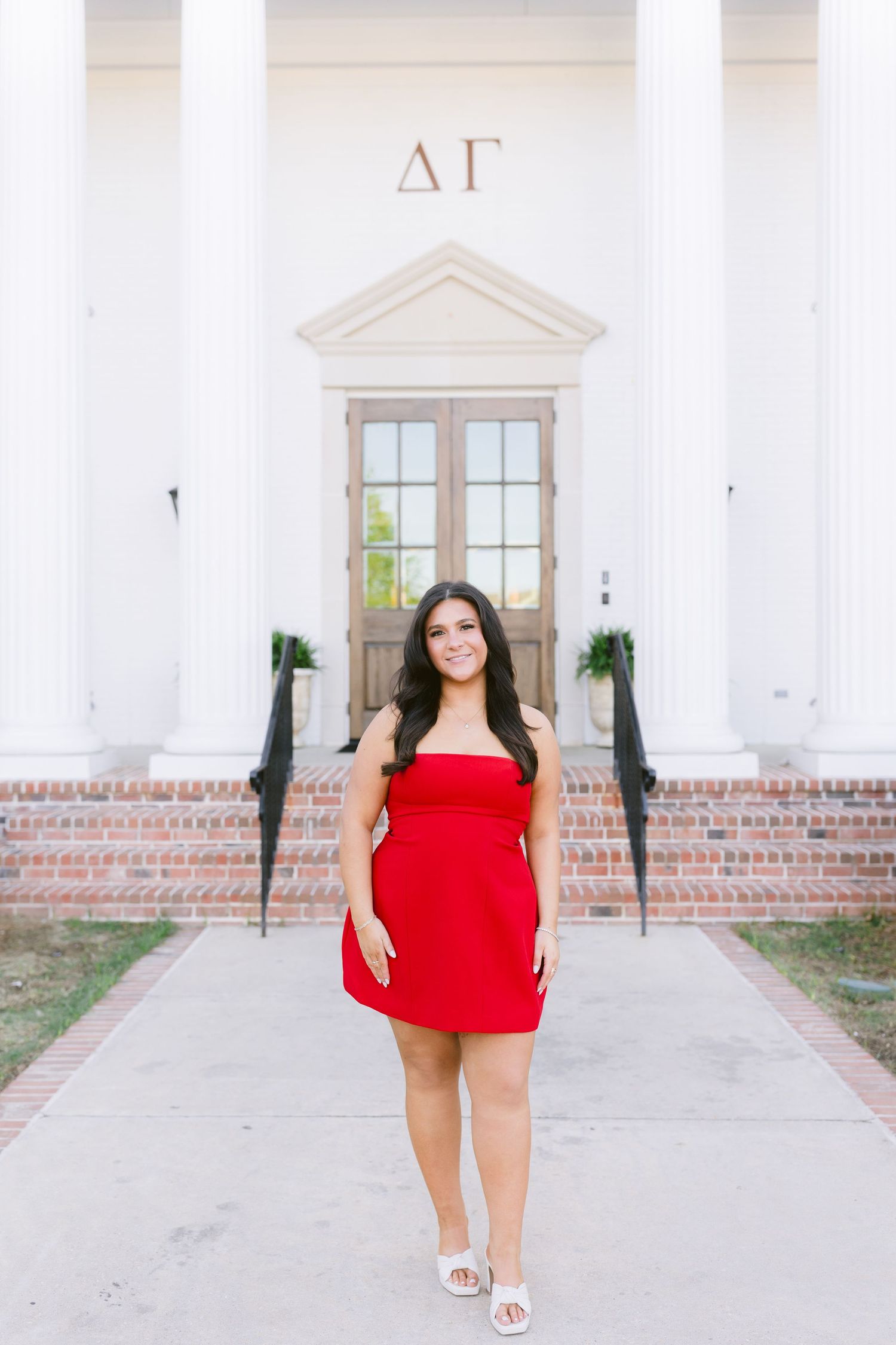 A split image showing someone in a bright red romper posing in front of a white building entrance with columns.