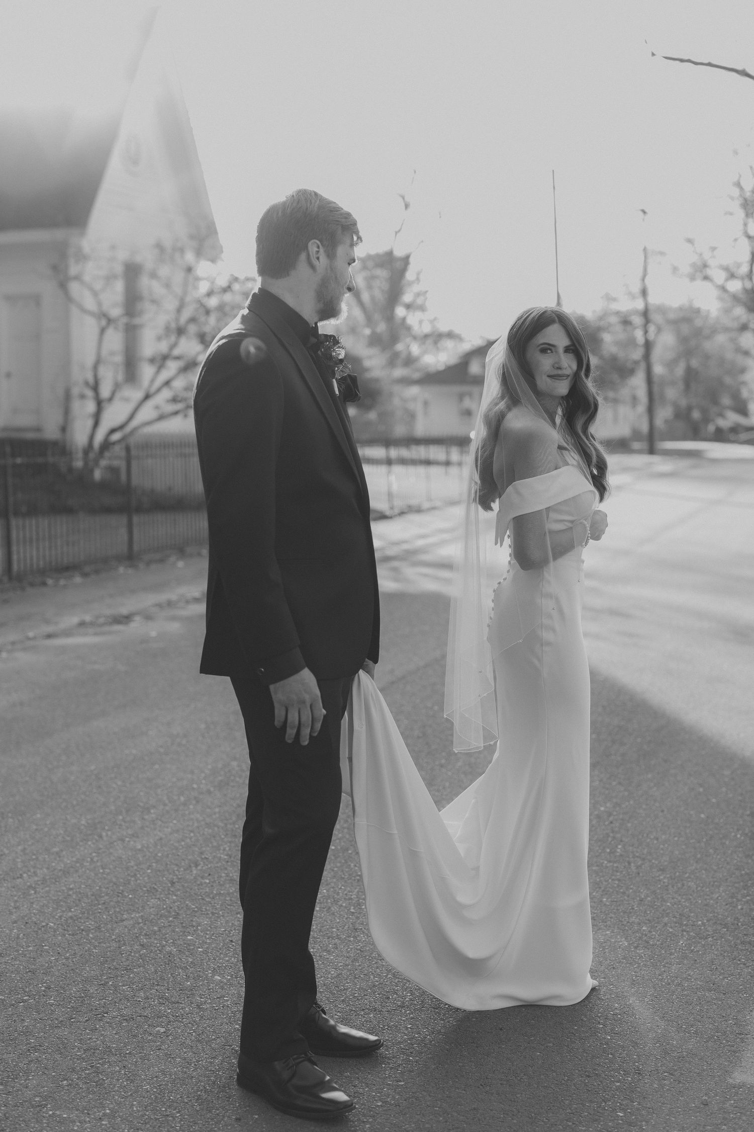 A black and white series of wedding photos showing the couple's intimate interaction outdoors.