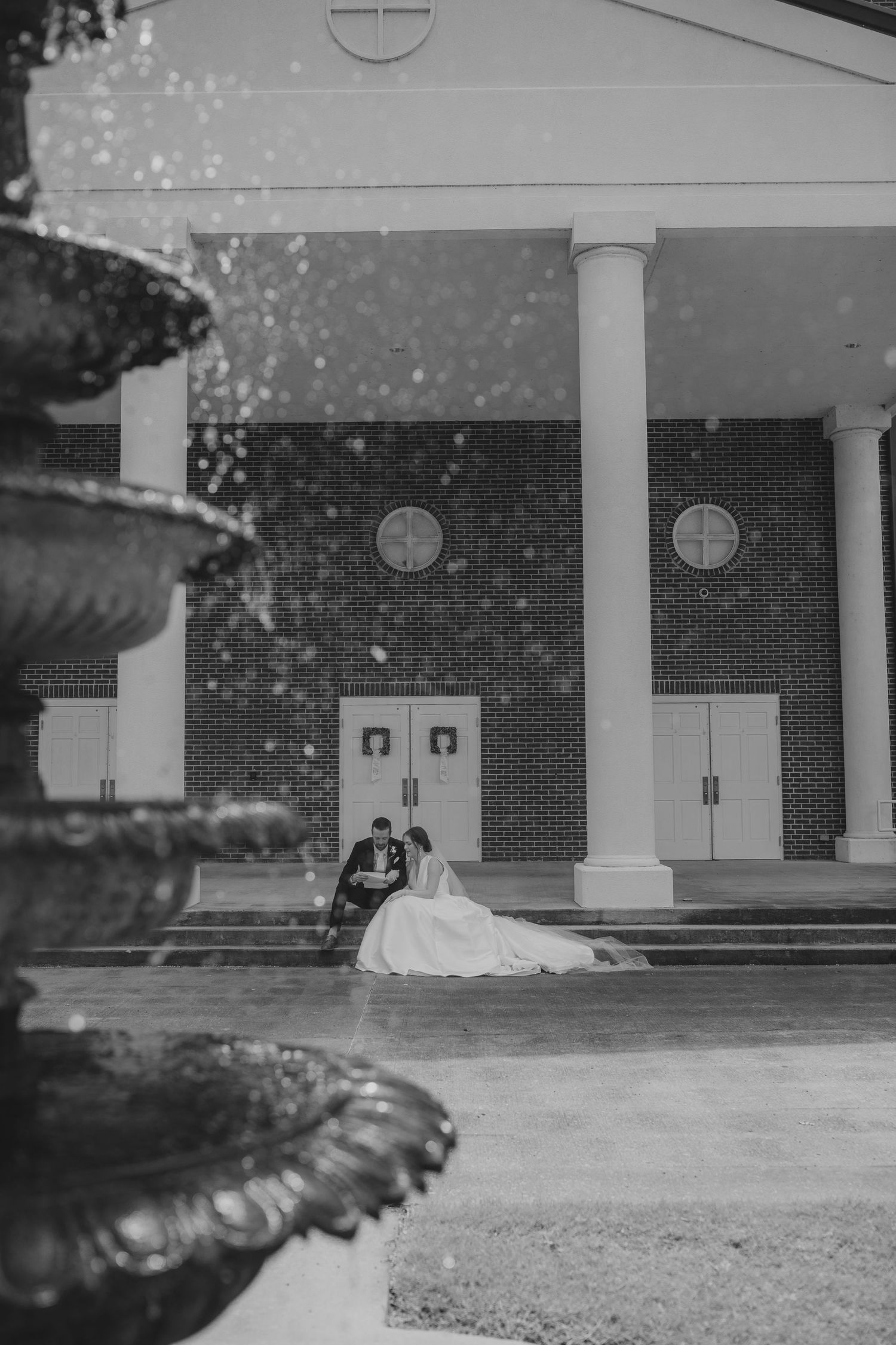 Black and white architectural shots of a church entrance with columns and brick detailing.