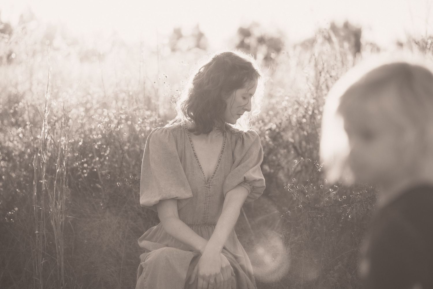 Dreamy outdoor wedding portraits with soft lighting and natural backdrop.