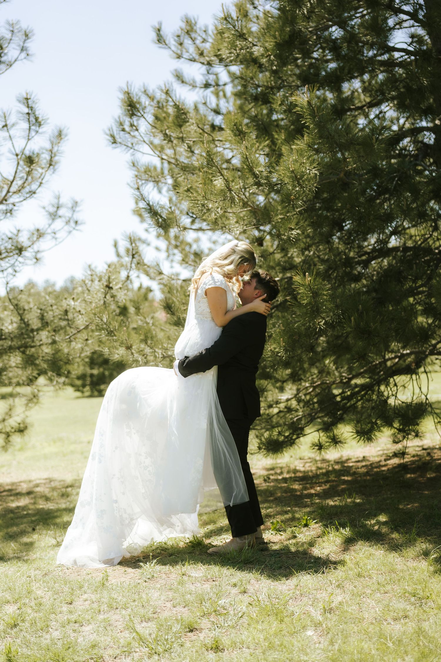bride and groom kissing