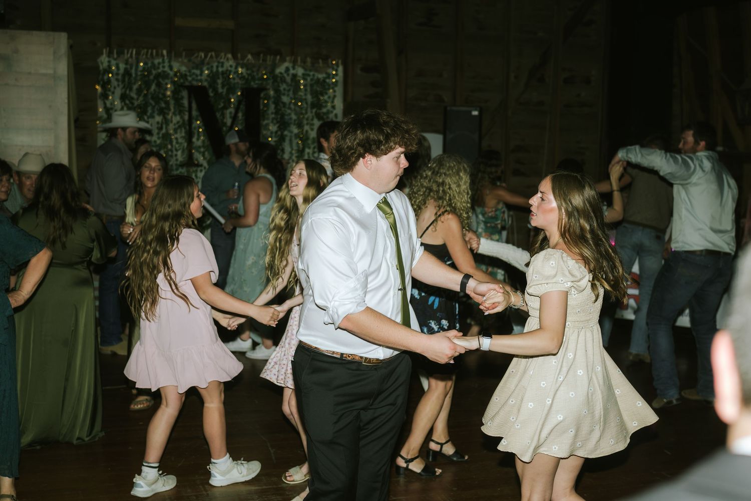 wedding reception photos with people dancing