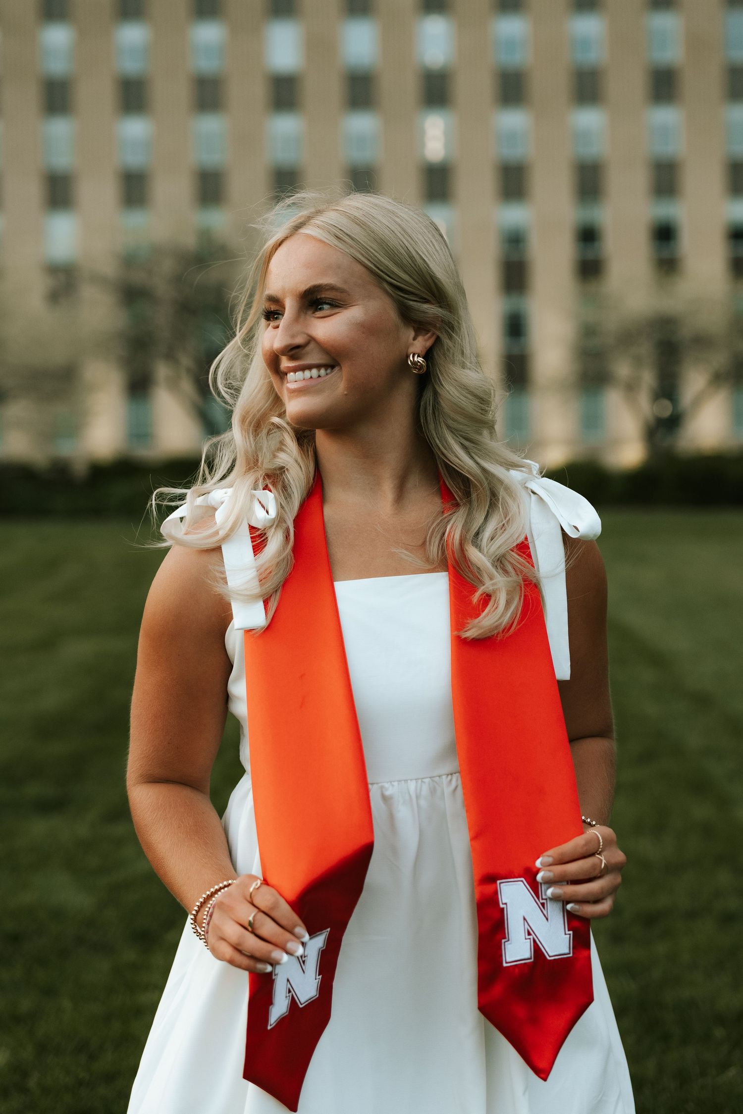 girl smiling for grad photos