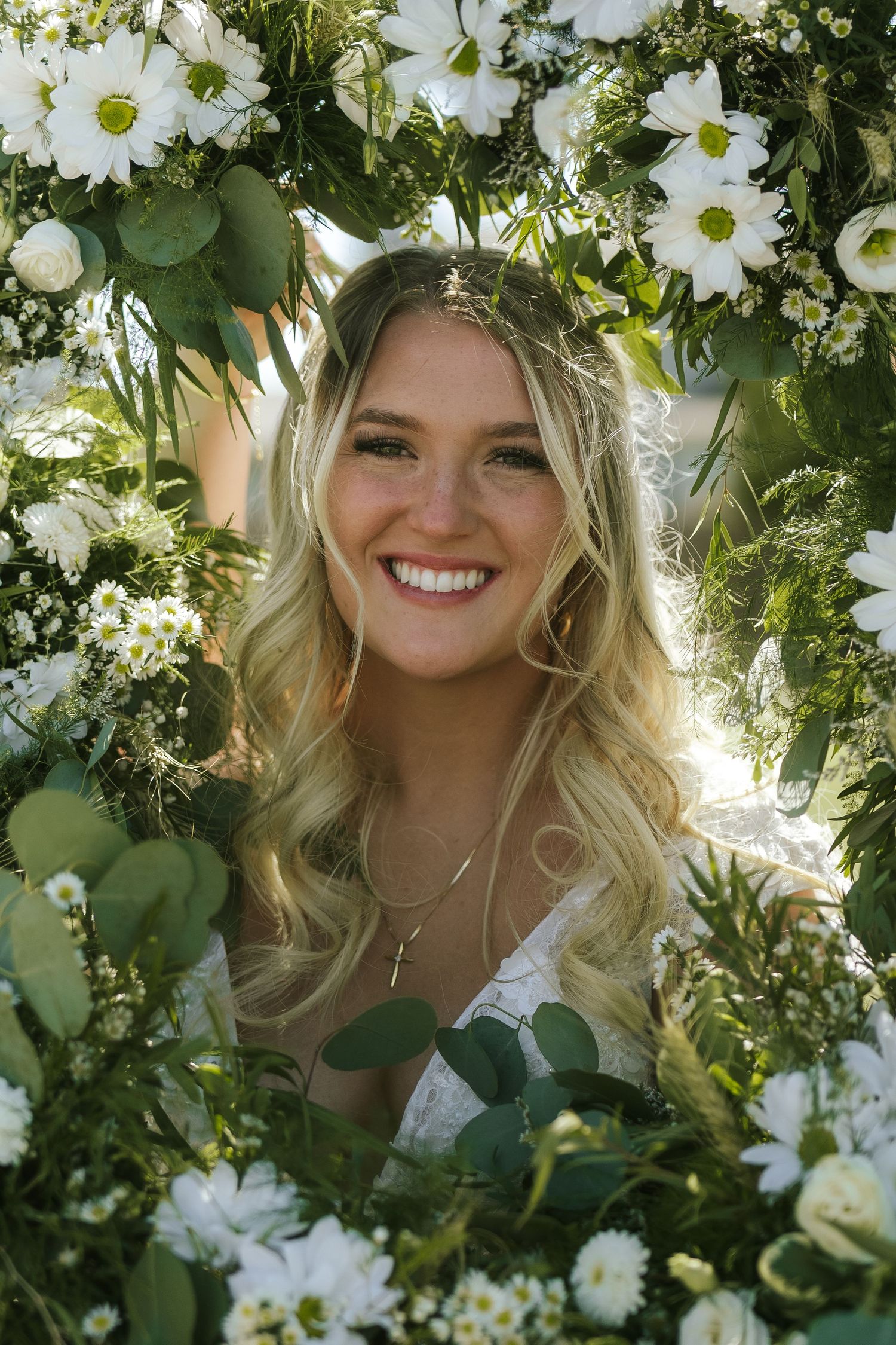 bride with flowers around her