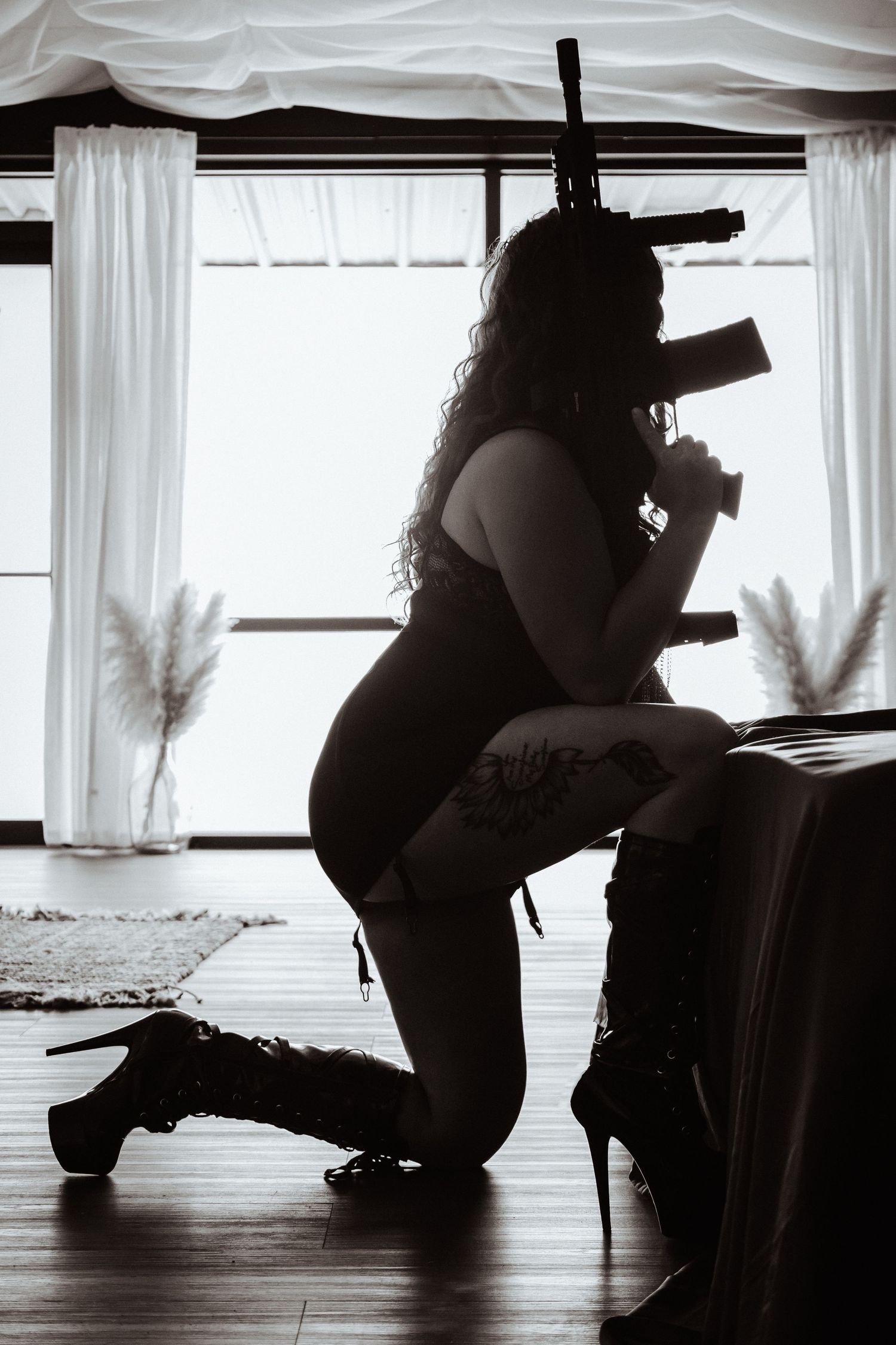 Artistic silhouette series of a person in various dramatic poses on a wooden floor with natural light from windows.