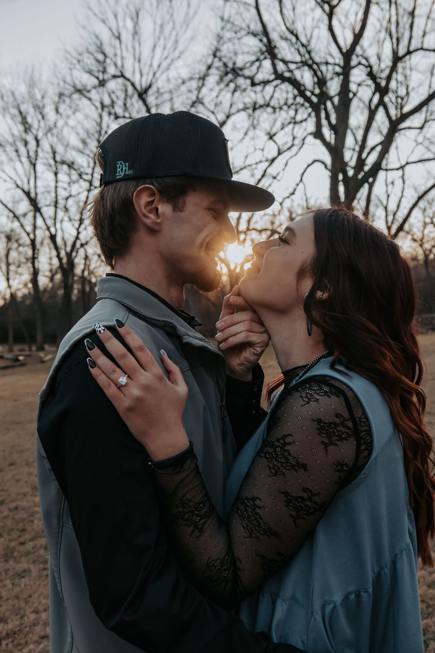 A romantic sunset proposal moment captured in a series of photos at a park with bare winter trees.