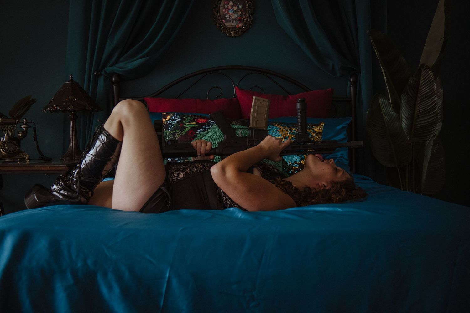 A series of five images showing someone lying down in different relaxed positions on a blue couch.