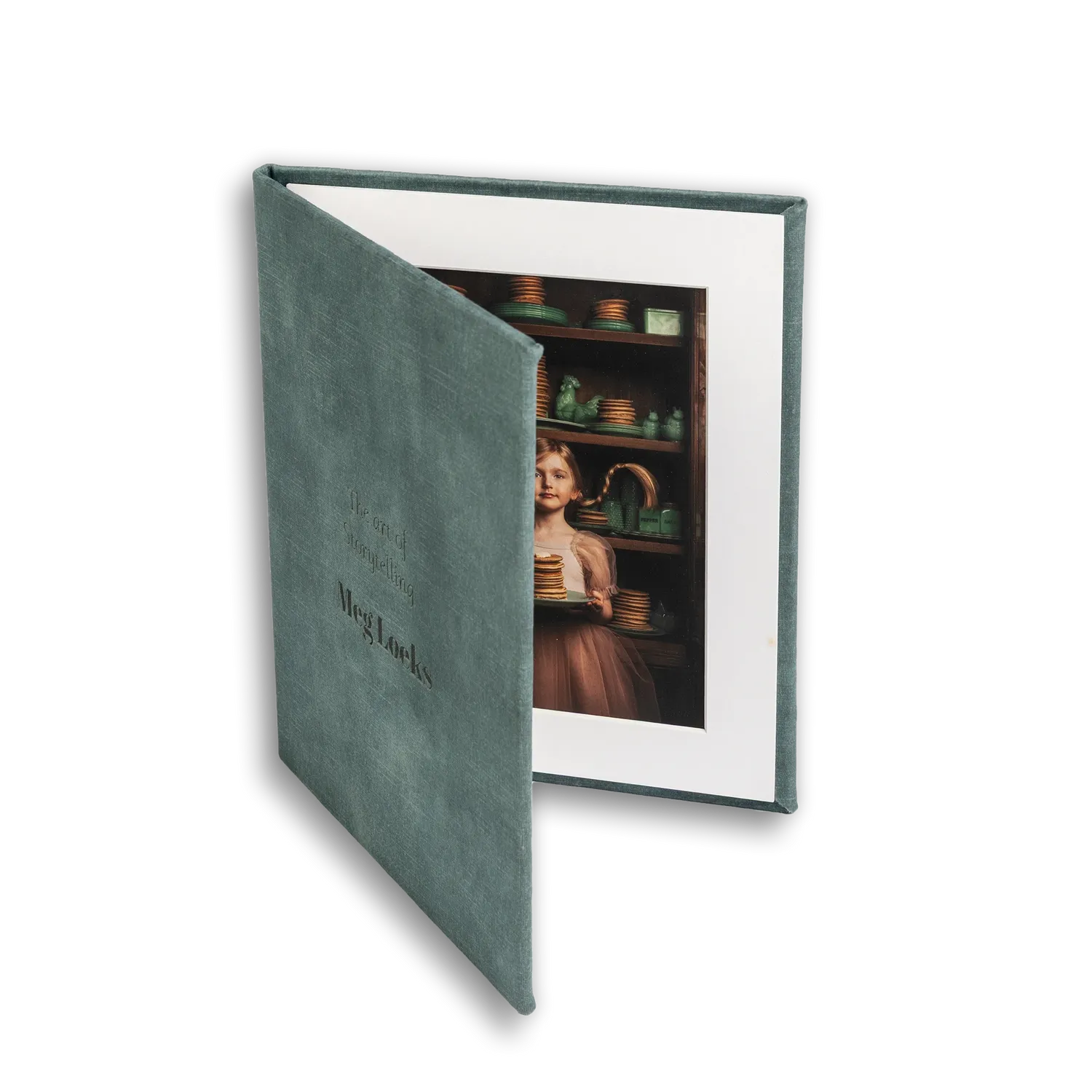 Four identical sage green photo album covers shown in a progressive opening sequence display.