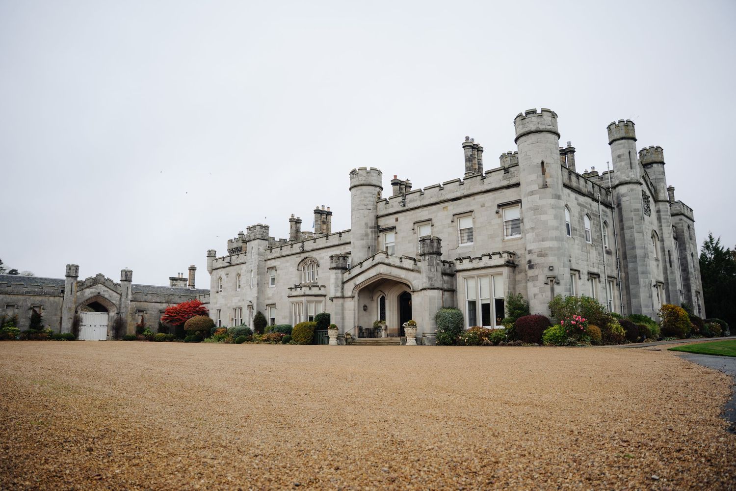 A panoramic view of Dundas Castle, a historic English estate with grand stone architecture and sprawling grounds.