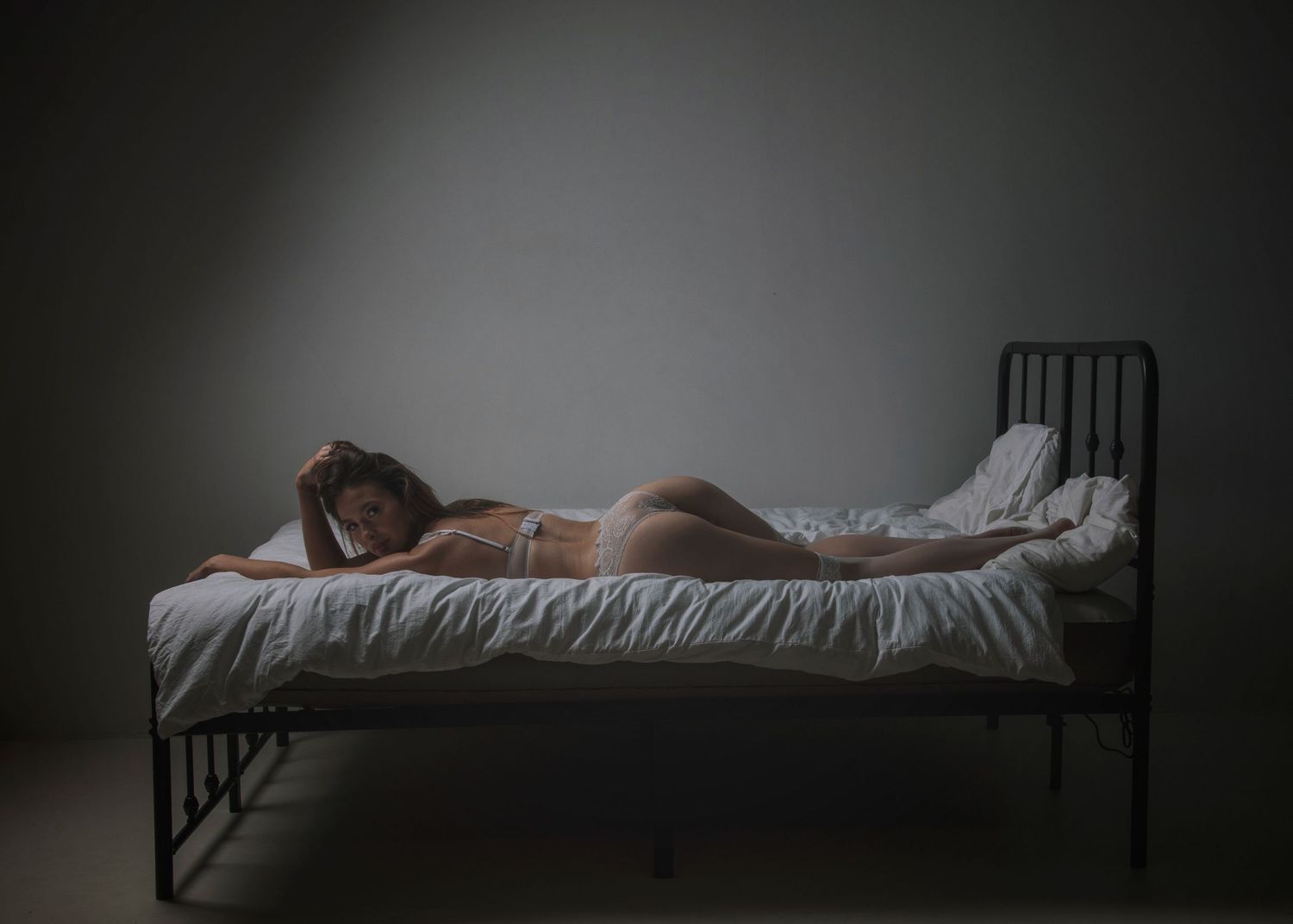 Boudoir photo of a lady photographed in a photography studio