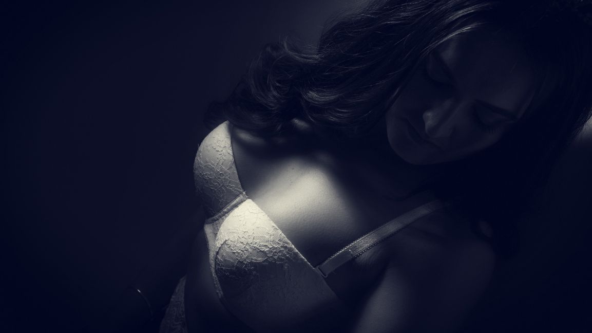 Boudoir photo of a lady photographed in a photography studio