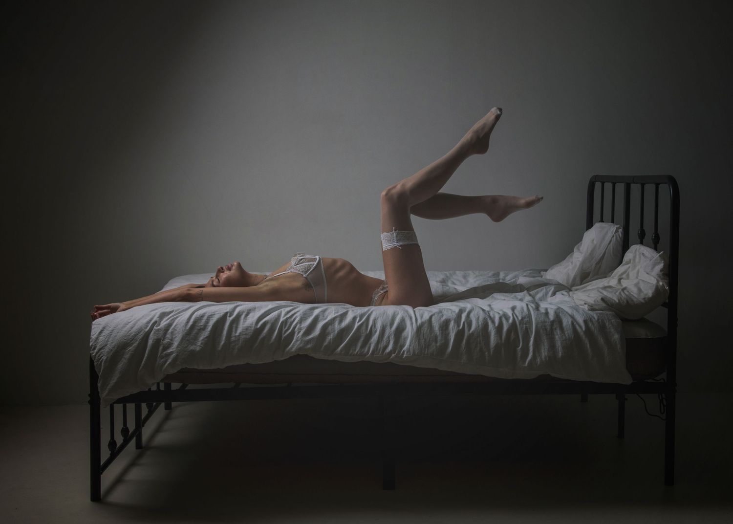 Boudoir photo of a lady photographed in a photography studio
