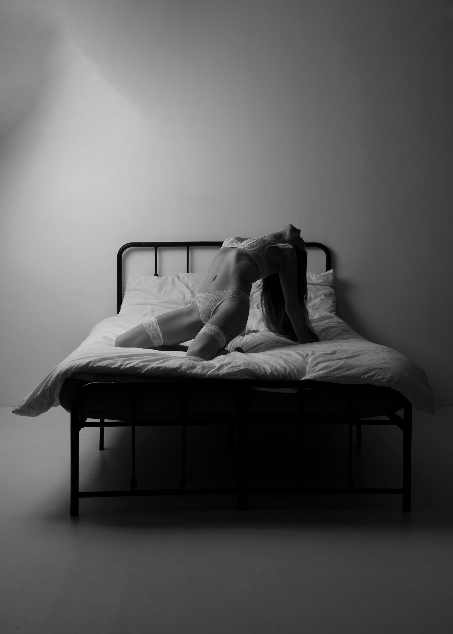 Boudoir photo of a lady photographed in a photography studio