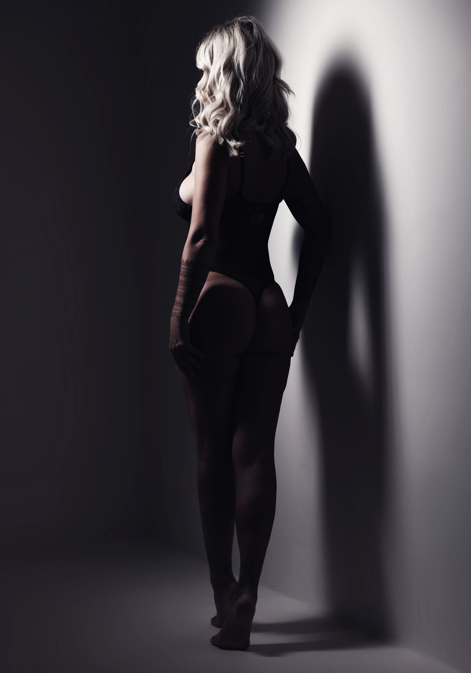 Boudoir photo of a lady photographed in a photography studio