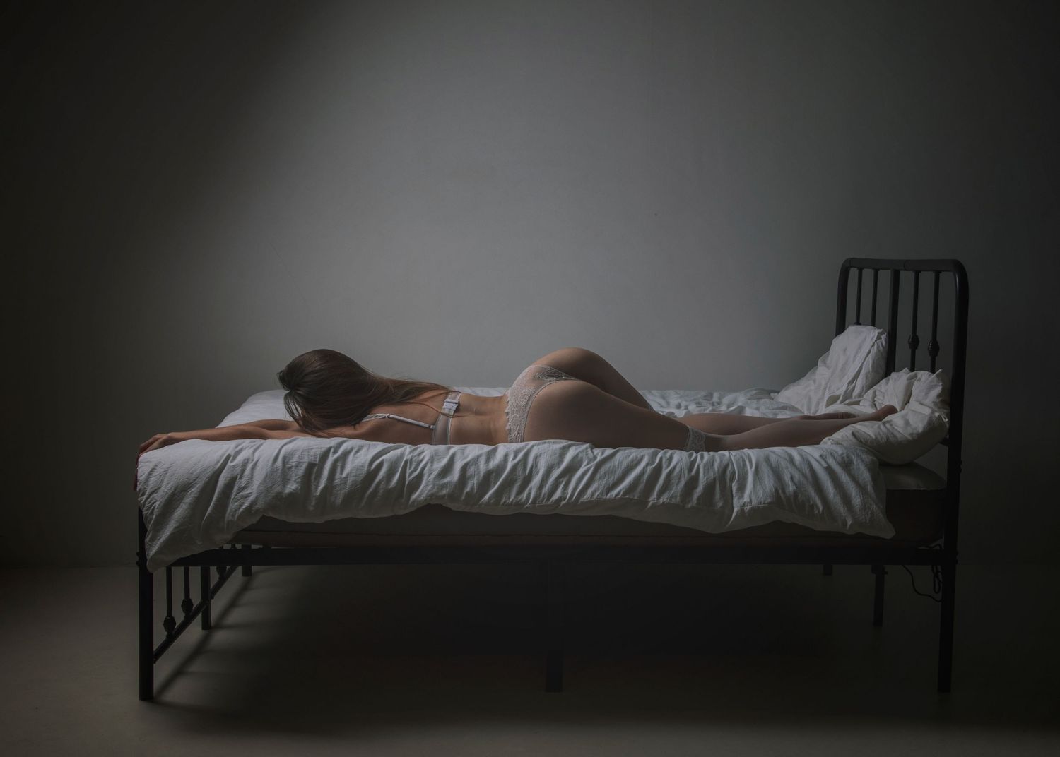 Boudoir photo of a lady photographed in a photography studio