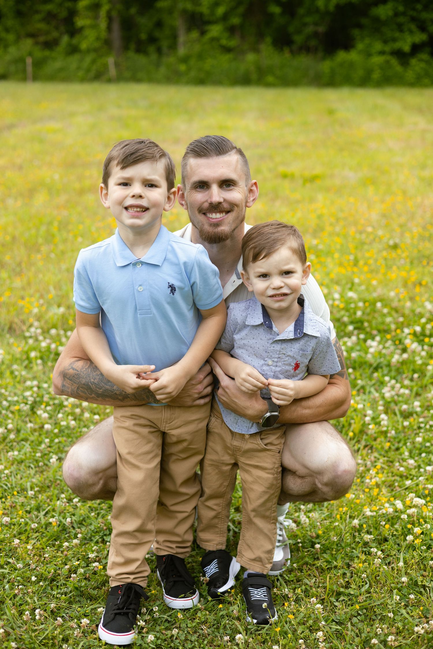 Father sitting outdoors with his two sons, Huntsville Alabama family session