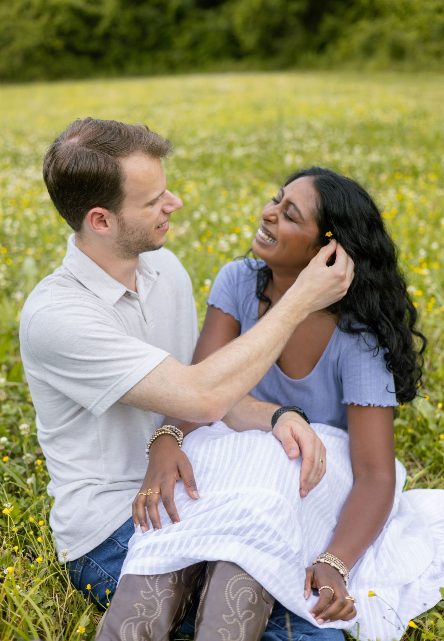 Couple laughing together in a sunny field, Huntsville Alabama couples photographer