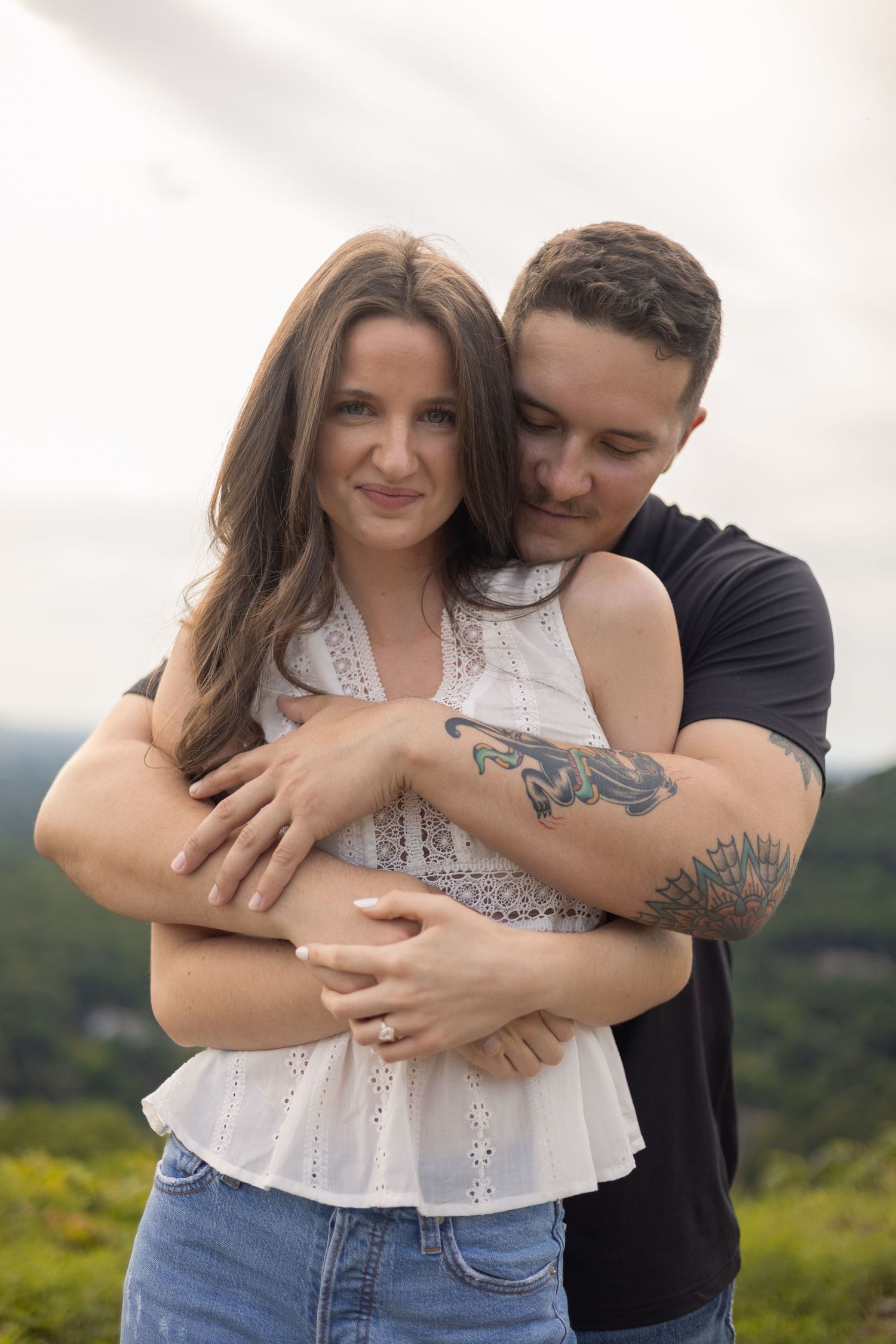 Couple embracing during their engagement session