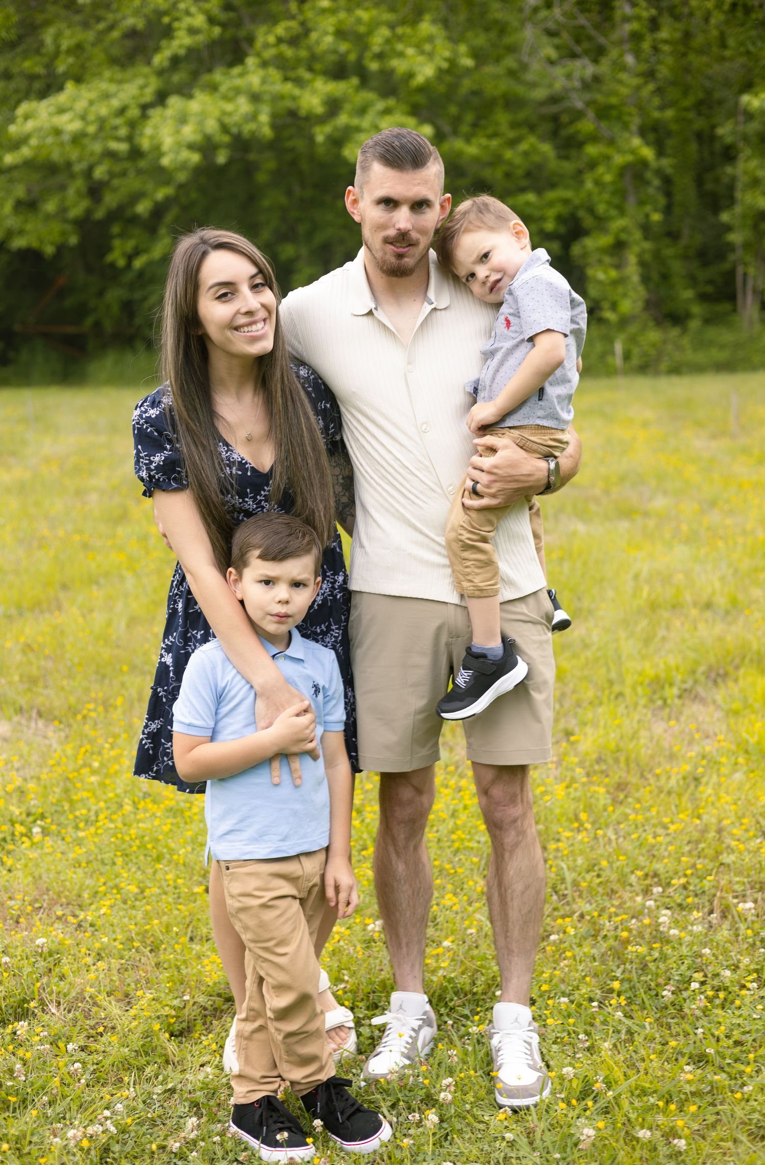 Family of four posing outdoors, Huntsville Alabama family session