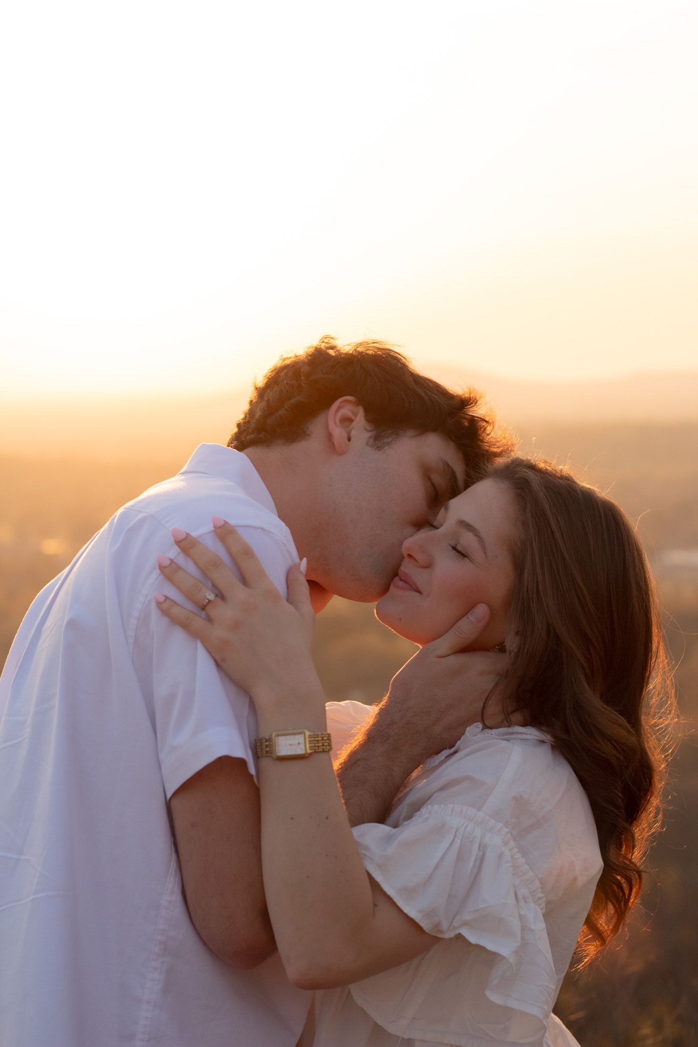 Couple kissing at sunset, Huntsville Alabama engagement photographer