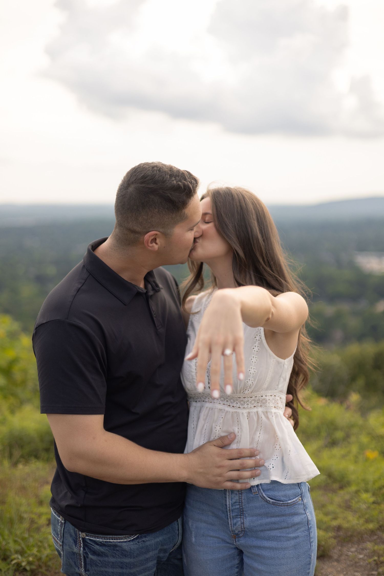Couple embracing during their engagement session