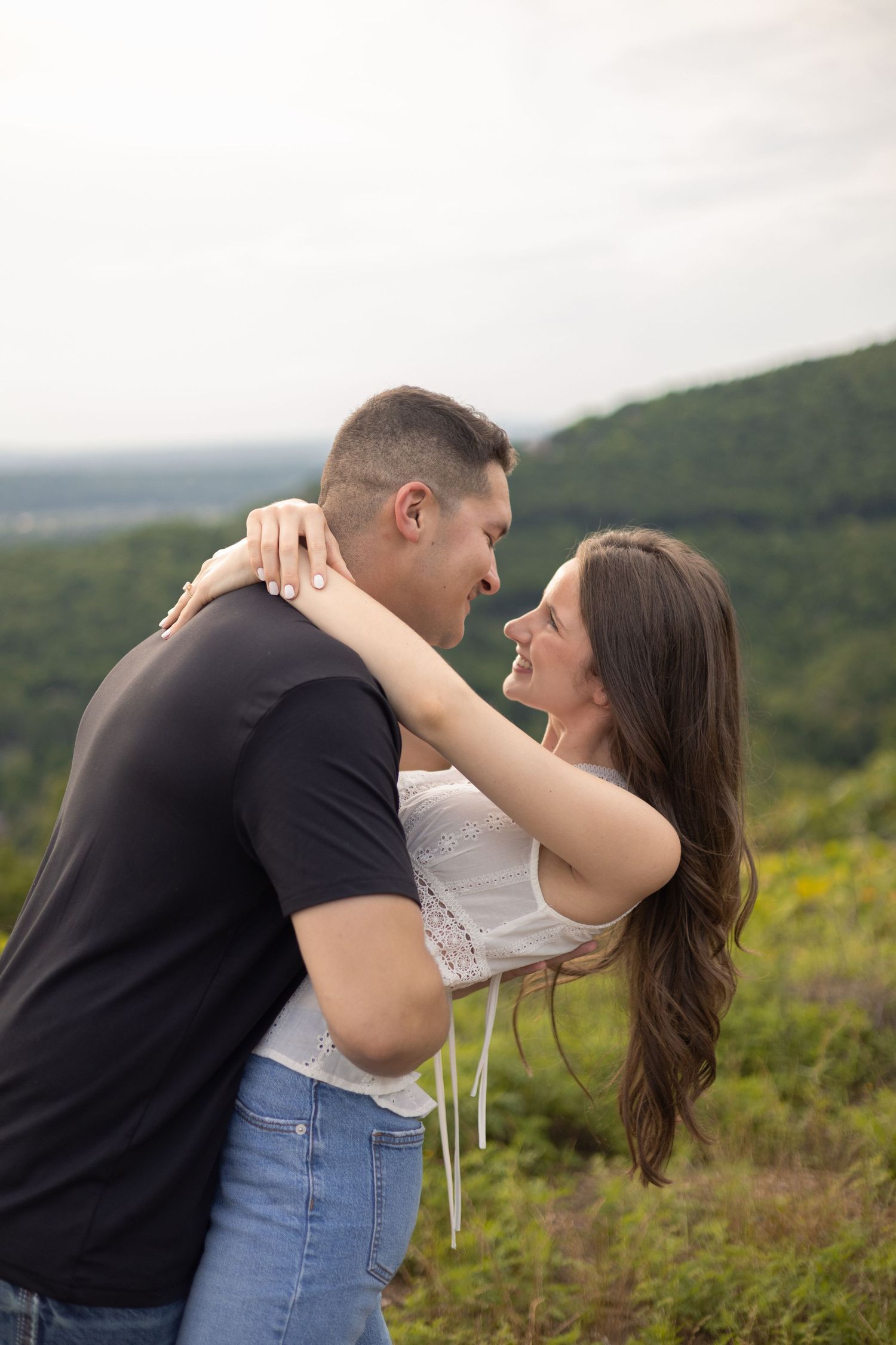 Couple embracing during their engagement session