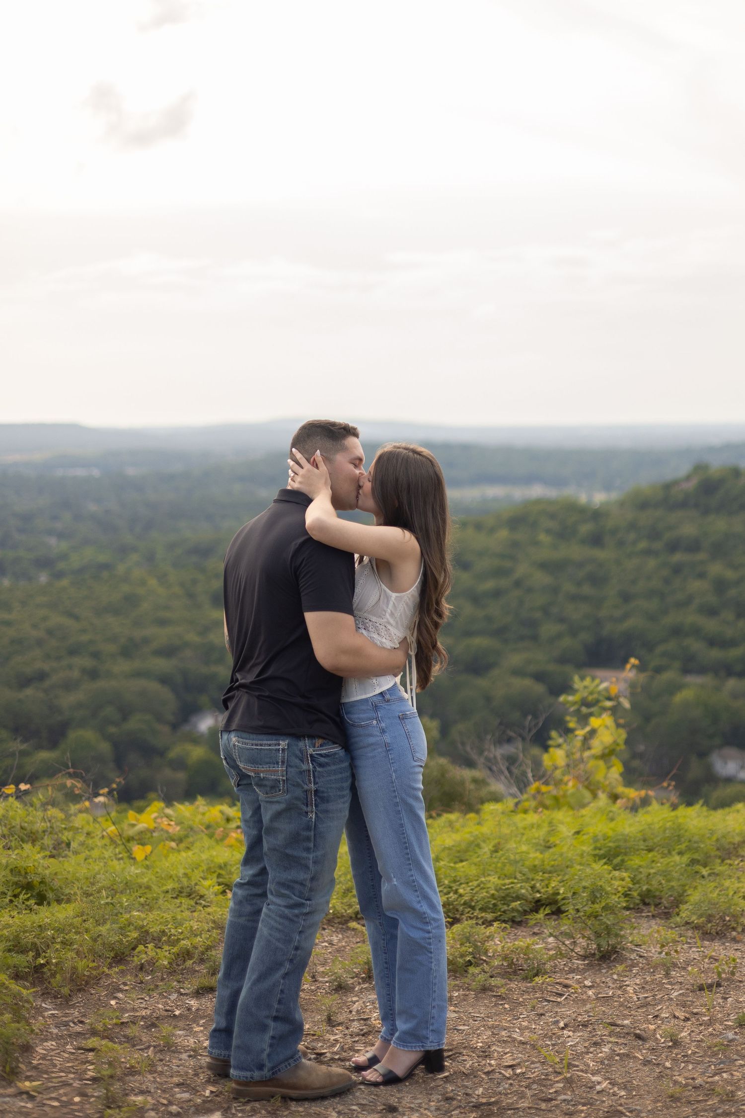 Couple embracing during their engagement session