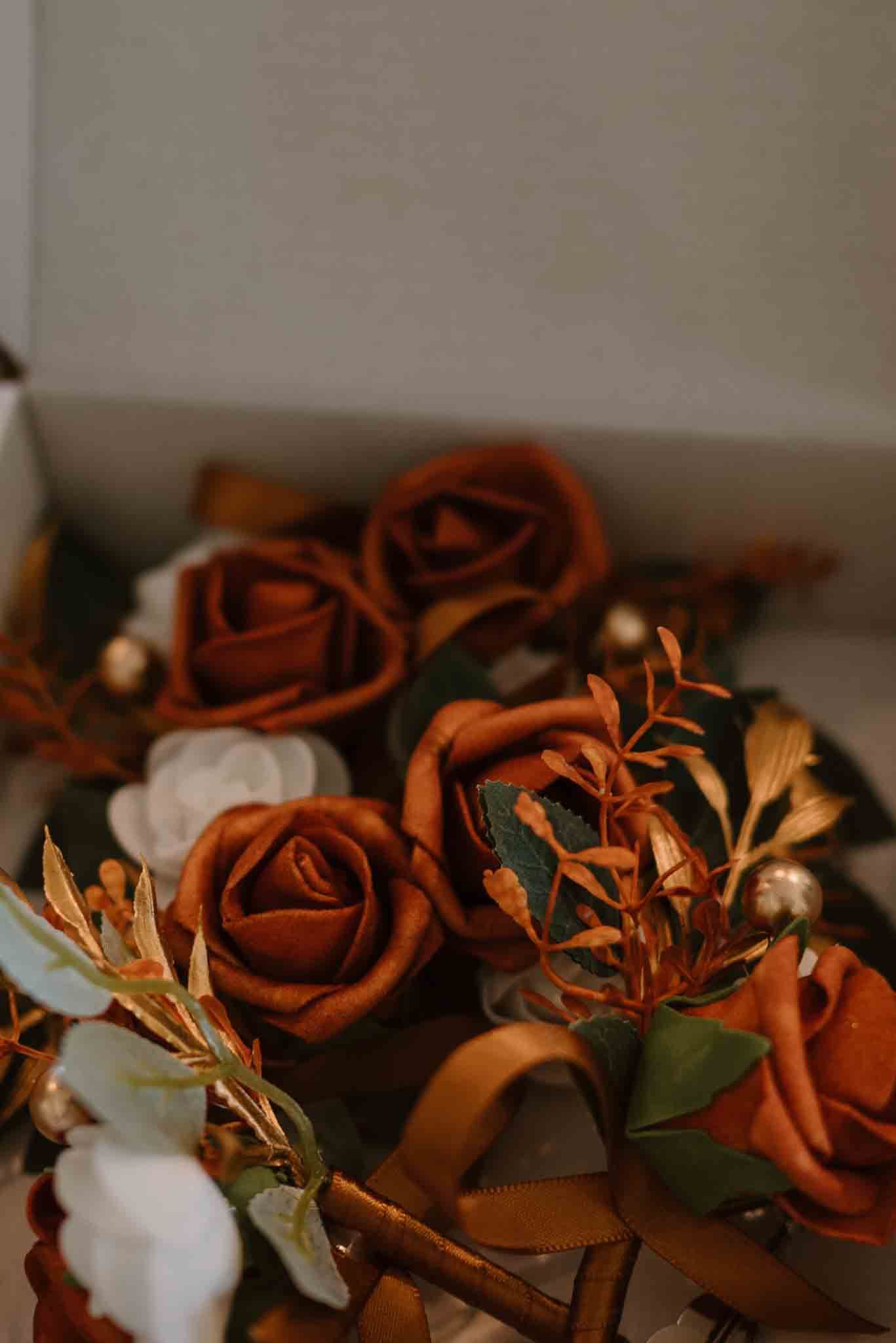 Wedding rings arranged with flowers and personal wedding details