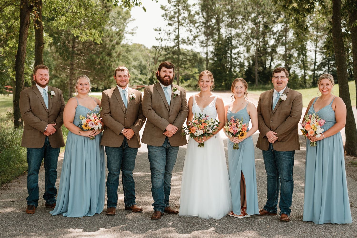 Newlyweds surrounded by their closest friends before the ceremony in Minnesota