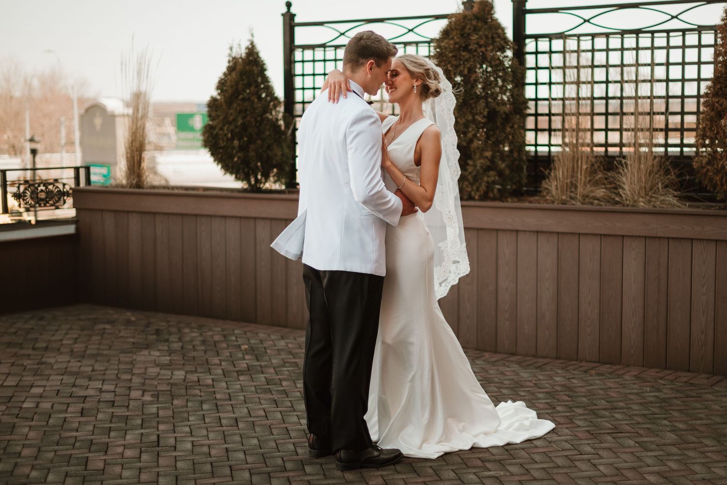 Couple sharing a quiet moment together after their ceremony in Iowa