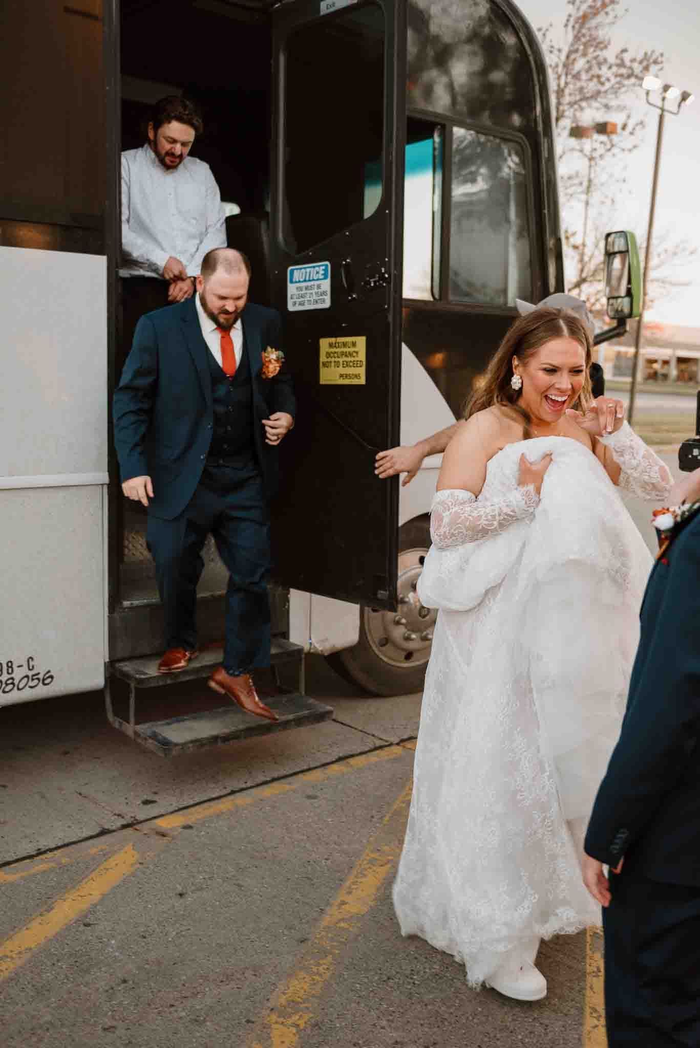 Newlyweds celebrating with friends on a party bus after their North Dakota wedding ceremony