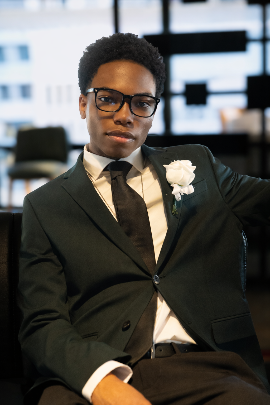 High school senior prom. Male in black suit and tie. Vera-Lane's Photography & Media