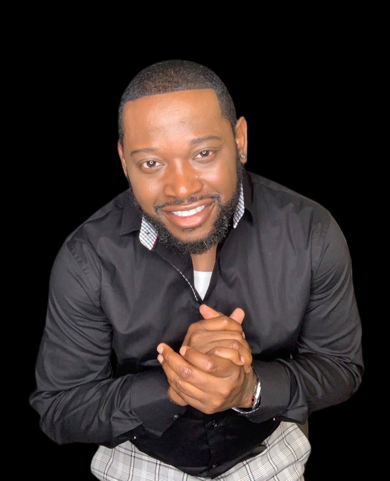 Male model in Atlanta GA with black shirt taking a portrait. Vera-Lane's Photography & Media