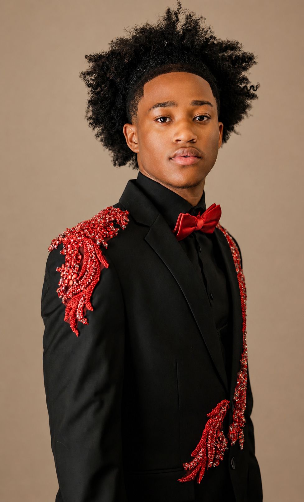 Senior prom photo in black and red suit. High School prom portrait. Vera-Lane's Photography & Media