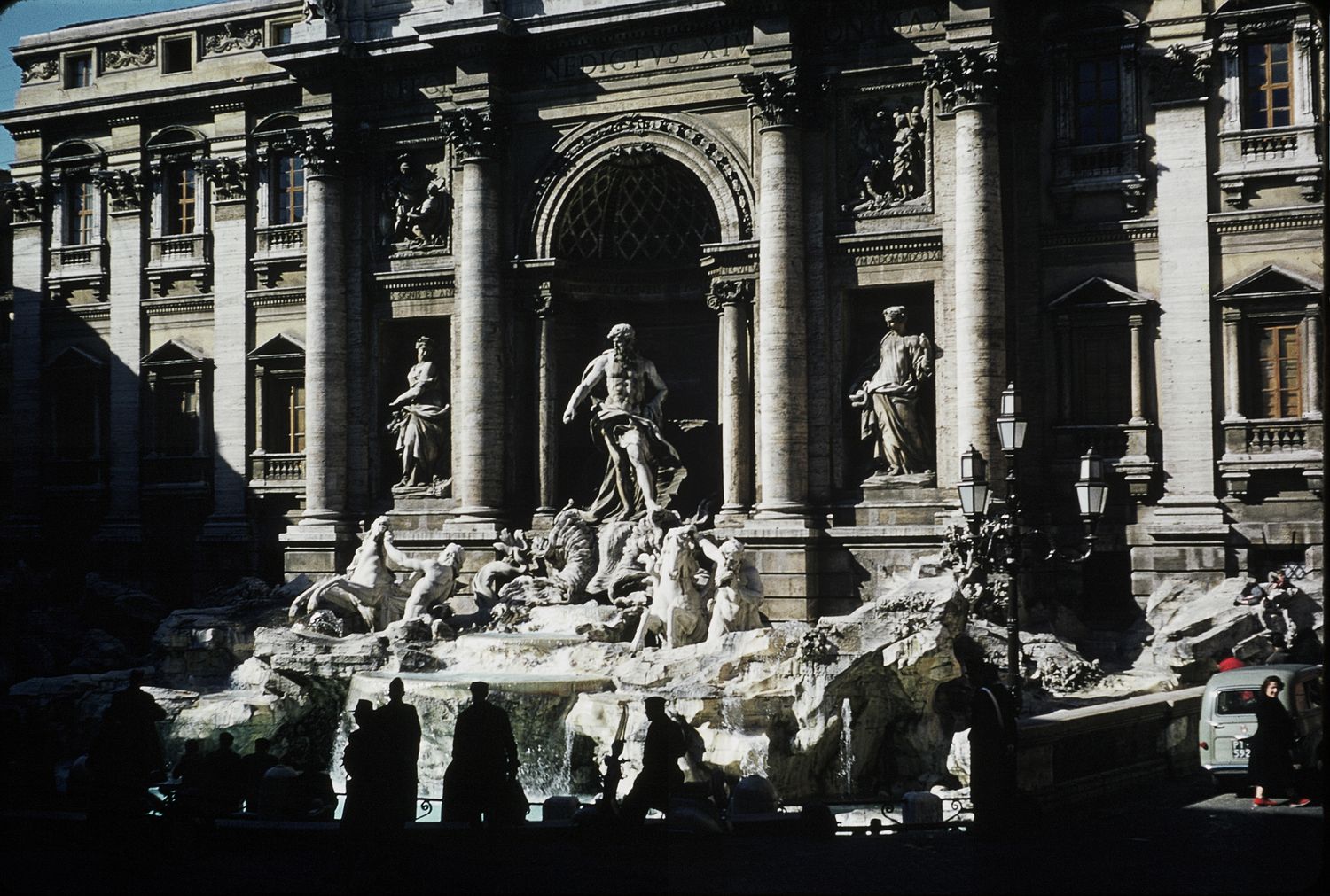The iconic Trevi Fountain in Rome, Italy, featuring ornate Baroque sculptures and architecture.