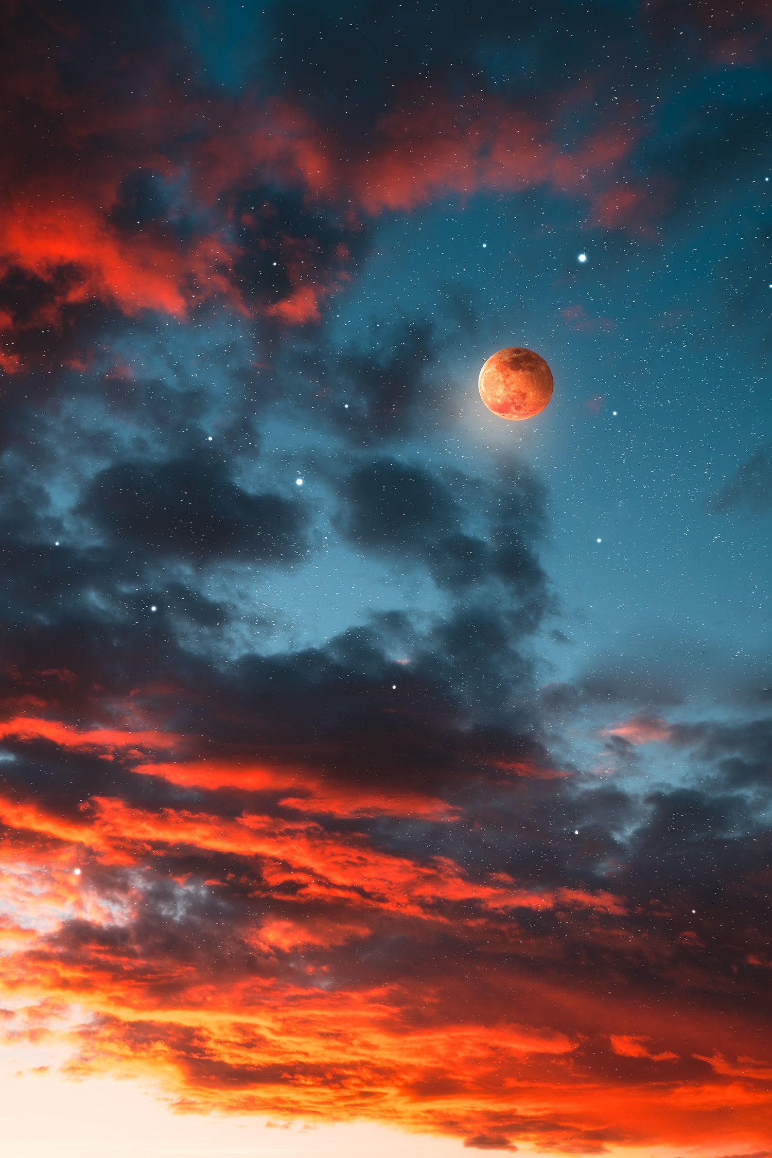 A dramatic blood moon rises through vivid red and blue storm clouds in a star-filled night sky.