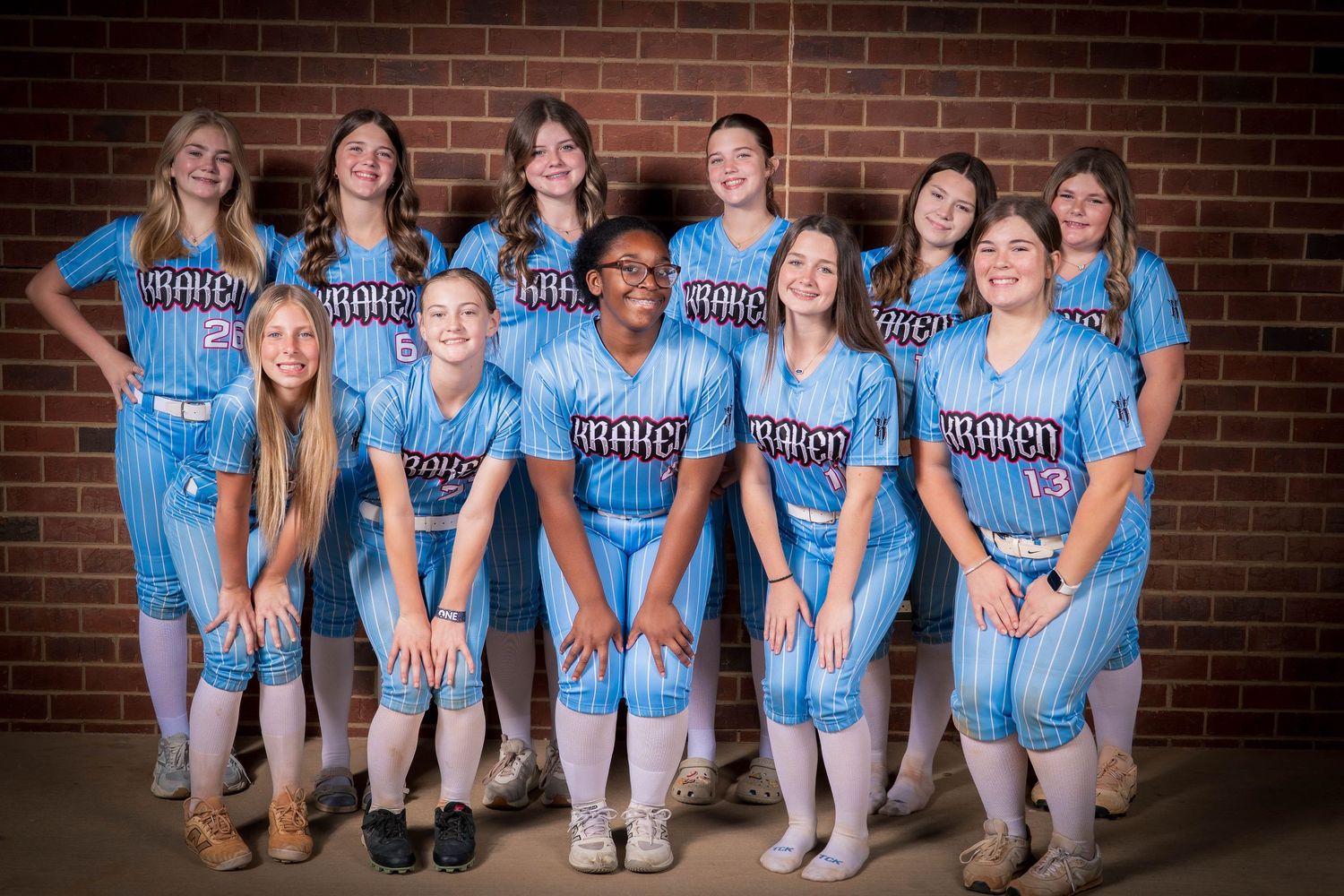 Youth softball team portrait during media day photography session