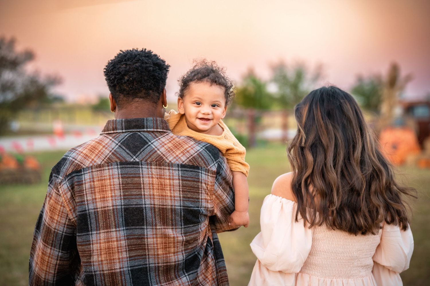 A series of candid shots showing tender interactions during a warm autumn evening outdoor photoshoot.