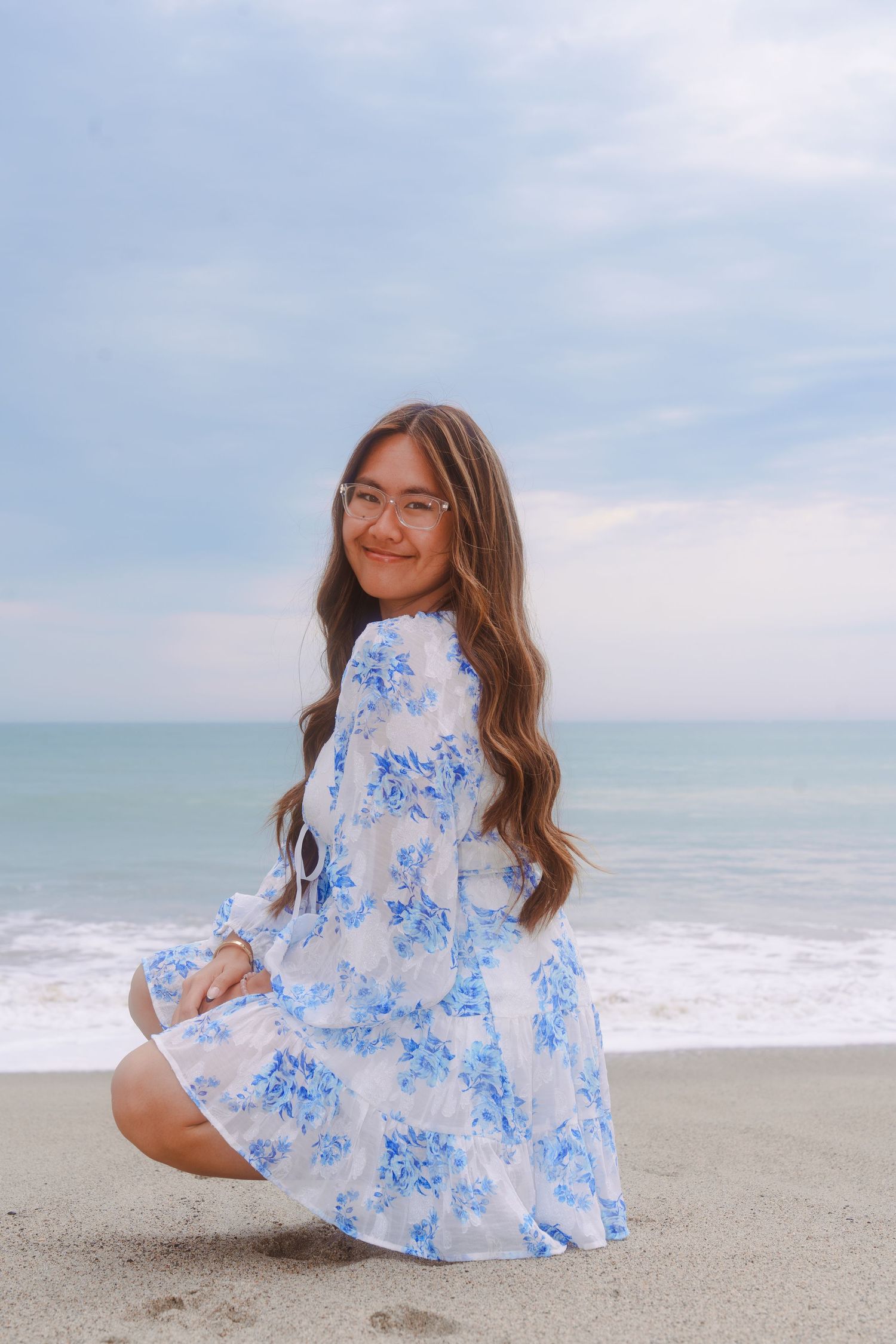 graduation photo of a girl at the beach