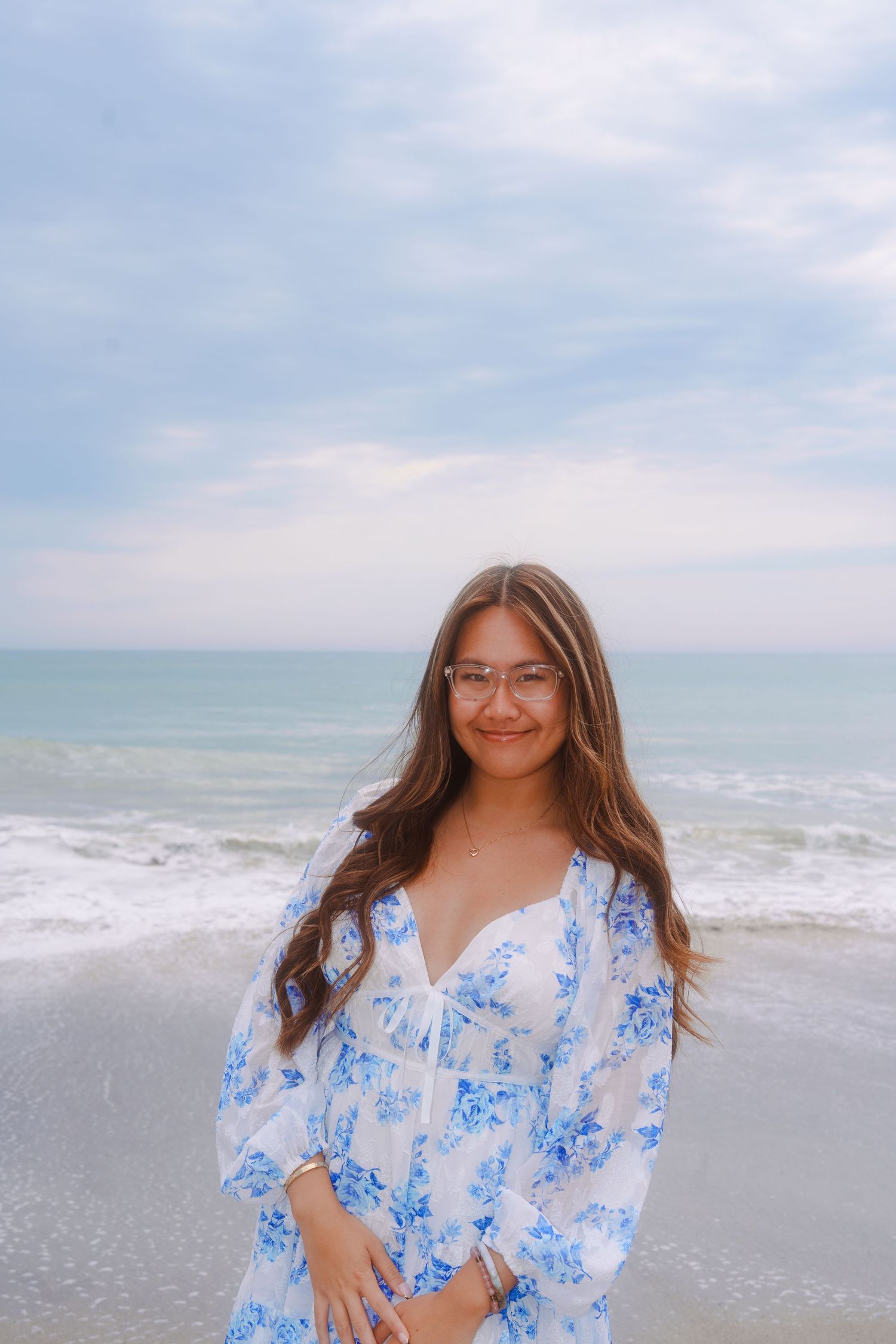 graduation photo of a girl at the beach