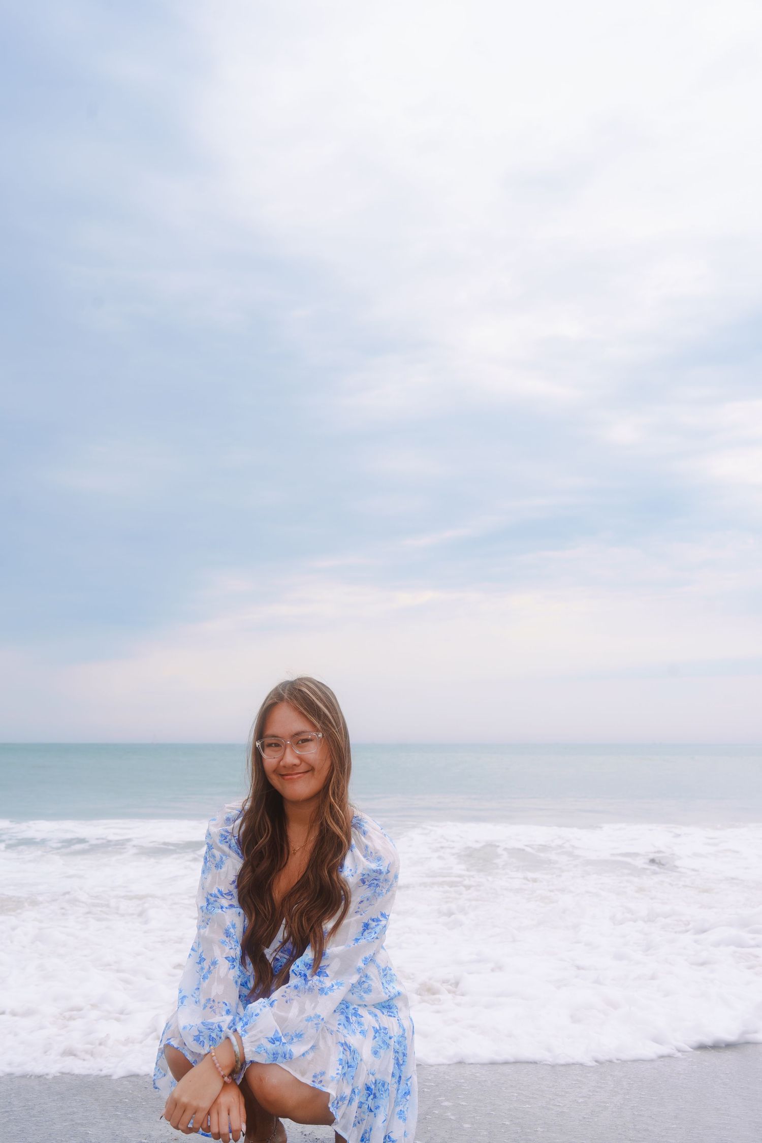 graduation photo of a girl at the beach
