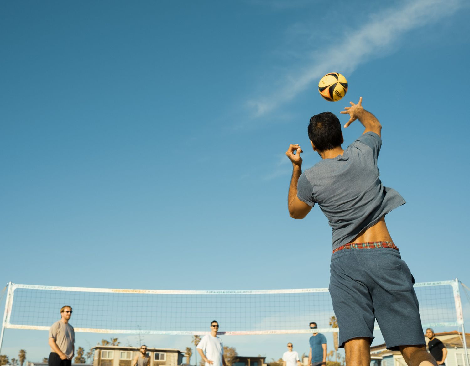 Action shot of a man playing volleyball