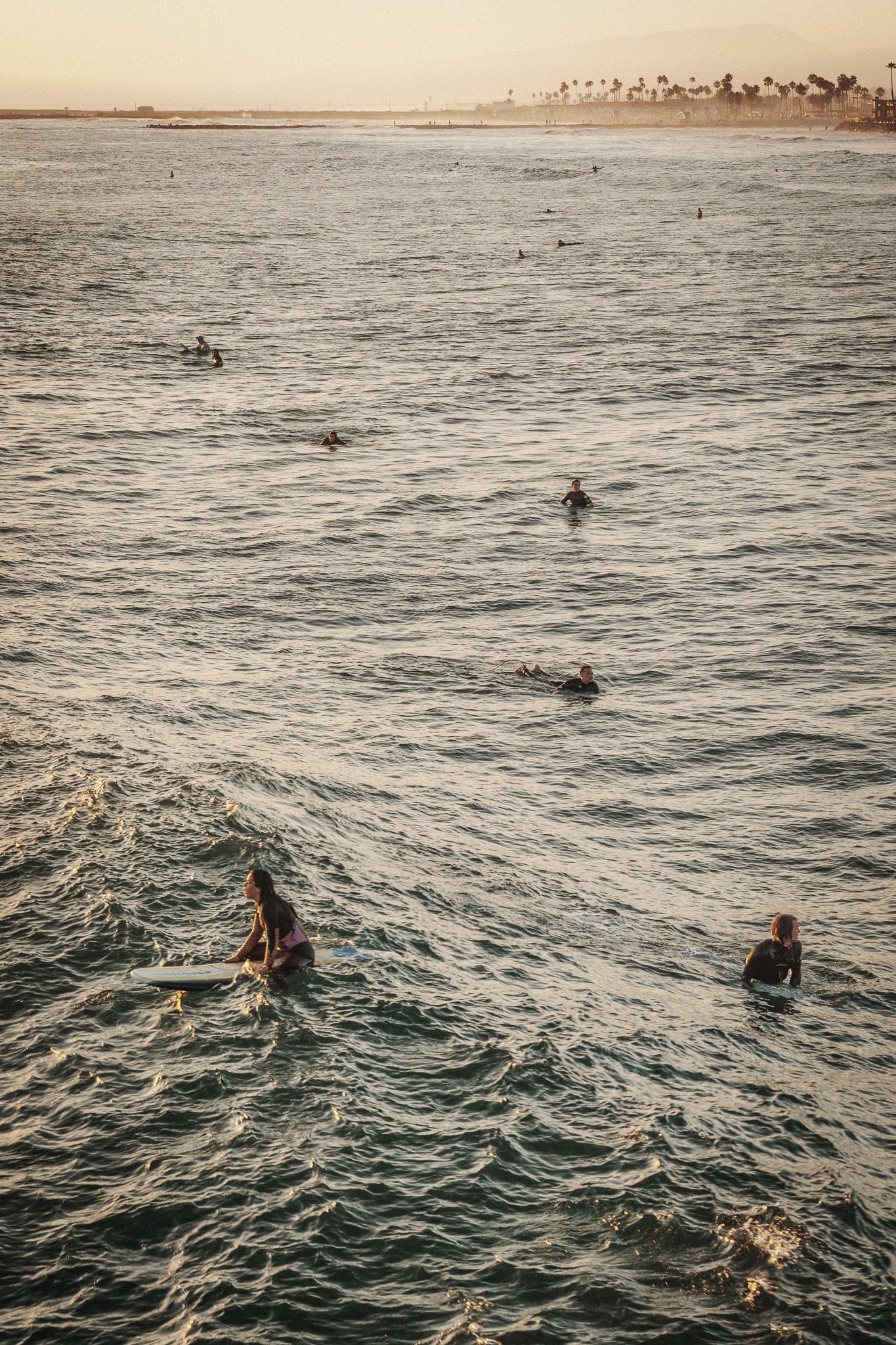 surfers in Oceanside waiting for a wave