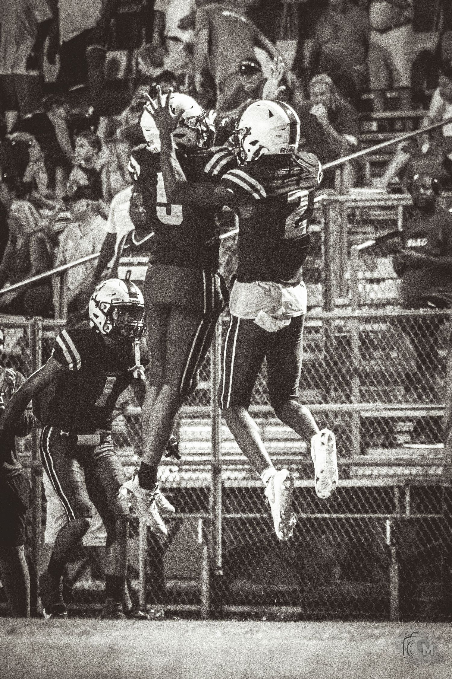 A photo of two football players celebrating a touchdown.