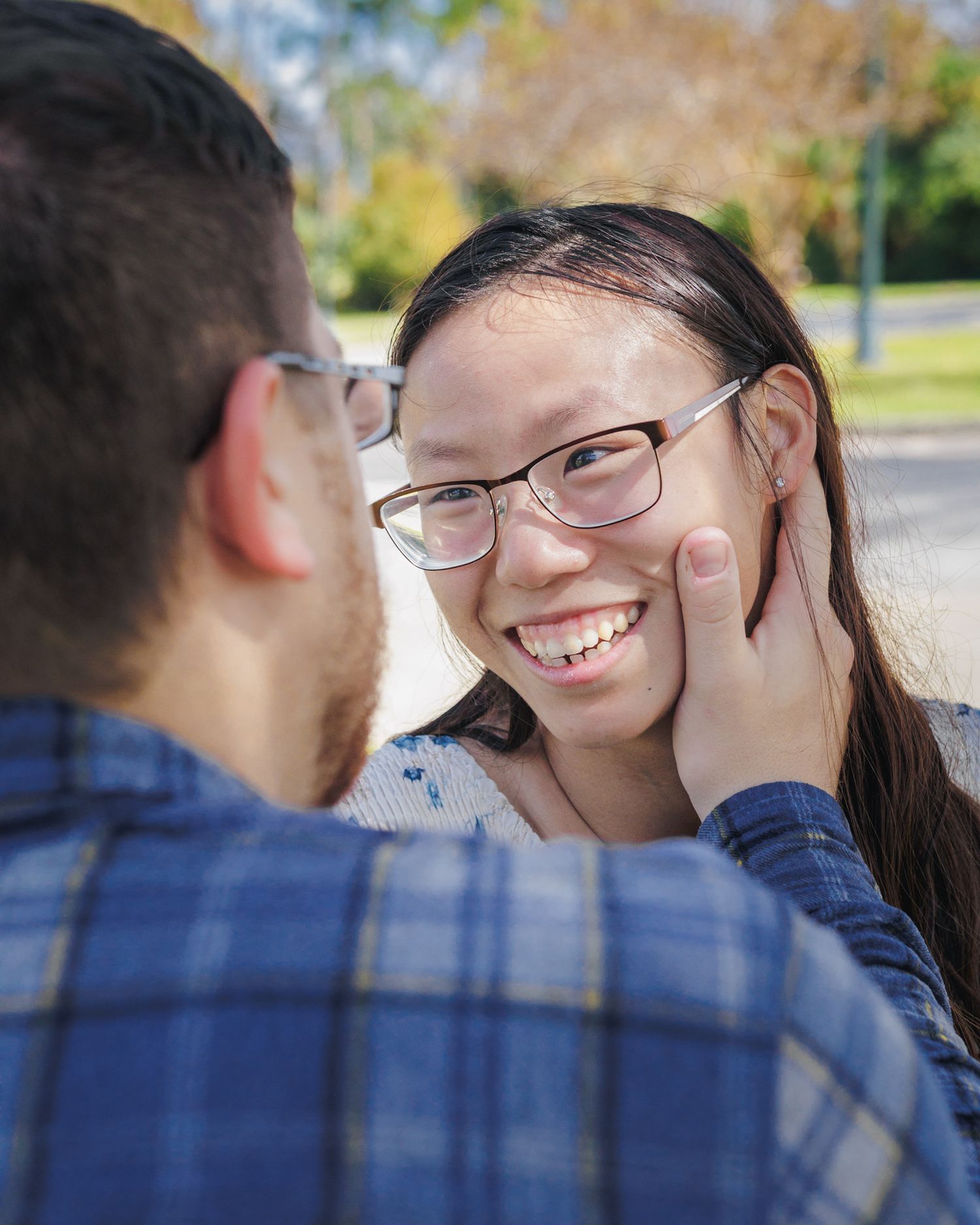 A couple looking into eachothers eyes and smiling