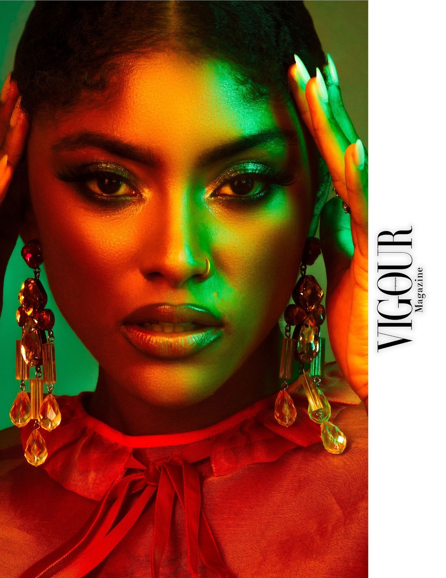 Artistic portrait series in vibrant red and green lighting creates dramatic contrasting shadows and moody atmosphere.