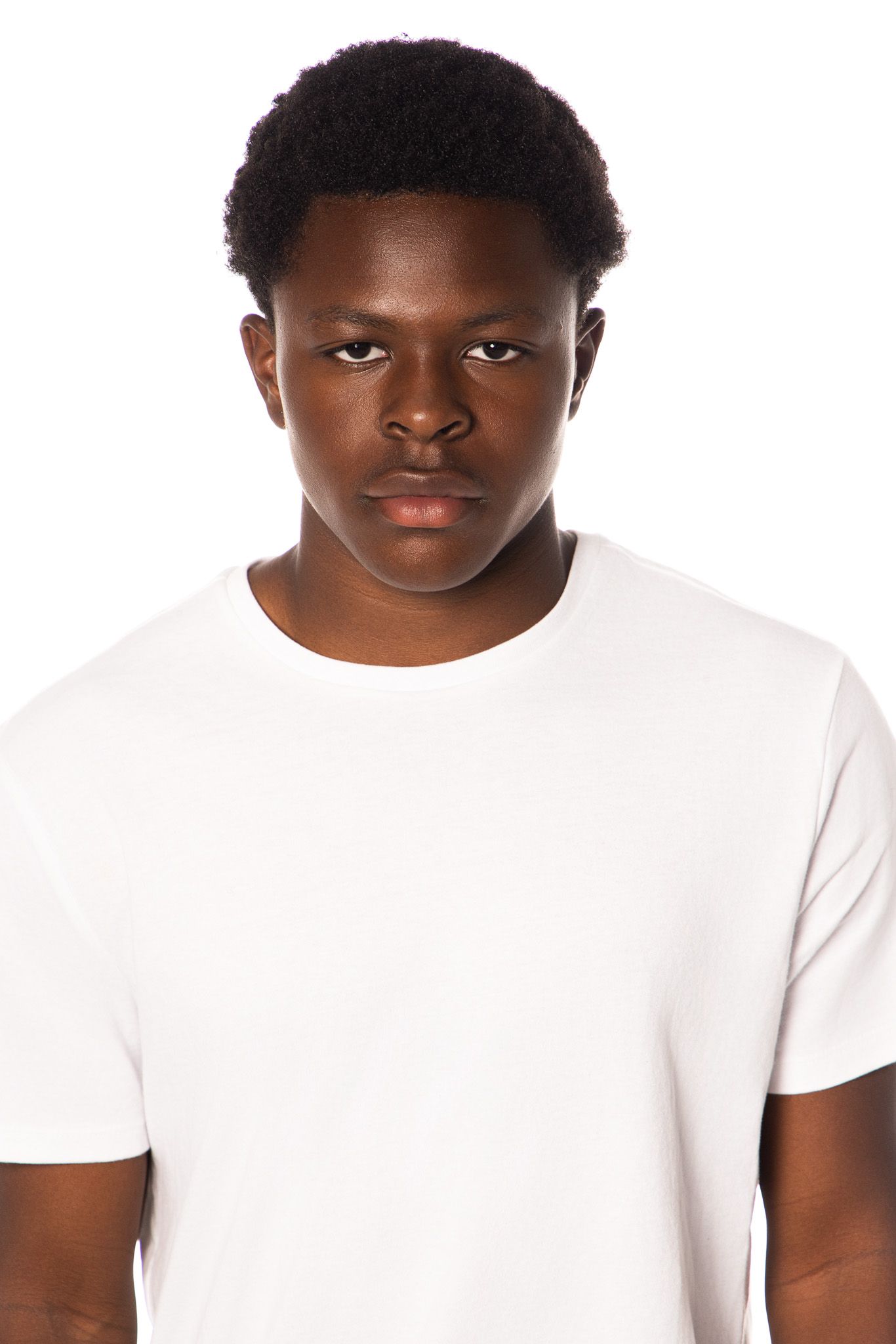Studio portrait of a person in white t-shirt against white background.