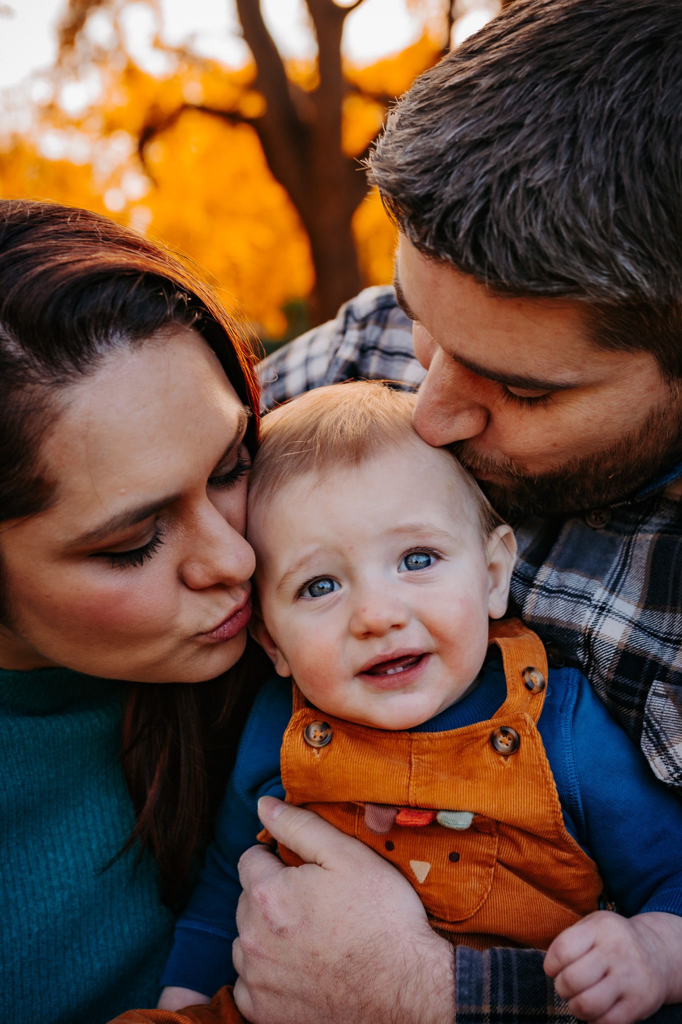 A series of tender family moments captured in autumn with warm orange foliage in the background.