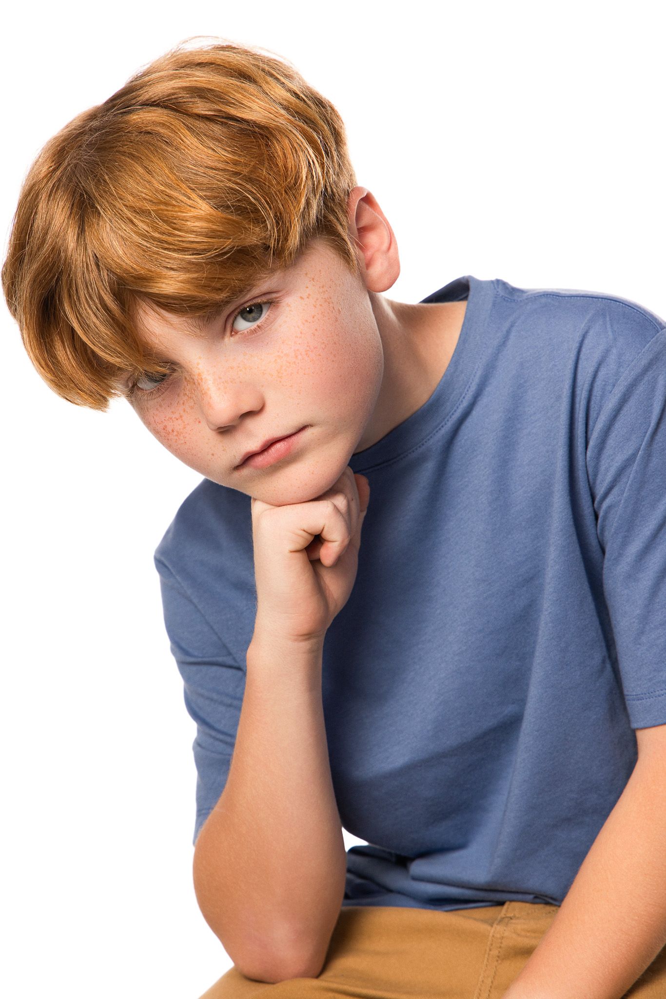 A sequence showing someone in a blue t-shirt resting their head on their hand with a contemplative expression.