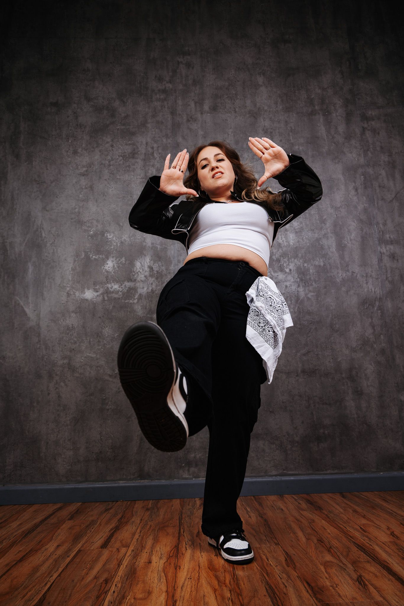 Dynamic breakdancing sequence showing athletic moves and flips against an industrial backdrop.